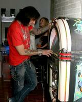 Michael Godard with Video Jukebox he deocrated Luxury Products Featured at the Store Platinum Collections Grand Opening Platinum Collections 345 6th Ave San Diego Ca 92101 March 22 2008 2008 photo