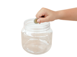 Child hand putting coin into transparent plastic money bottle or piggy bank isolated with clipping path in png file format. Concept of saving money for the future or money growth