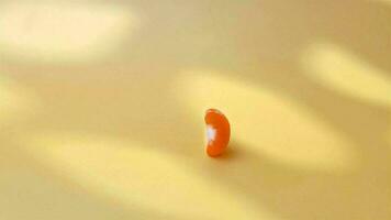 Mandarin tangerine stop motion animation magic video tangerine is twisted and peeled