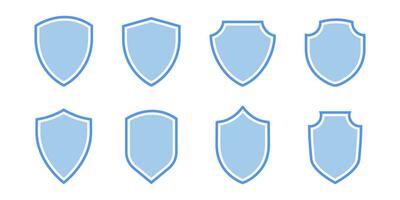 Shield icon in flat. Blue shield badge. Shield emblem set. Security badge in flat. Safety emblem icon set vector