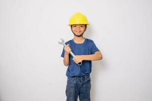 Boy wearing yellow hat  engineer idea photo
