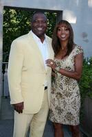 LOS ANGELES  JUL 24 Holly Robinson Peete  Rodney Peete arrives at the 12th Annual HollyRod Foundation DesignCare Event at Ron Burkles Green Acres Estate on July24 2010 in Beverly Hills CA photo