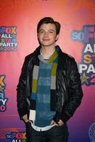 LOS ANGELES  AUGUST 2 Chris Colfer arrives at the 2010 FOX Summer Press Tour Party at Pacific Park on the Santa Monica Pier on August 2 2010 in Santa Monica CA photo