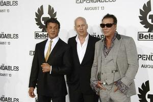 LOS ANGELES  AUGUST 3 Sylvester Stallone Bruce Willis  Mickey Rourke arrives at The Expendables LA Premiere at Graumans Chinese Theater on August 3 2010 in Los Angeles CA photo