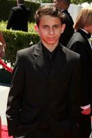 LOS ANGELES  AUG 21 Moises Arias arrives at the 2010 Creative Primetime Emmy Awards at Nokia Theater at LA Live on August 21 2010 in Los Angeles CA photo