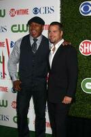 LOS ANGELES  JUL 28 LL Cool J  Chris ODonnell arrives at the 2010 CBS The CW Showtime Summer Press Tour Party at The Tent Adjacent to Beverly Hilton Hotel on July28 2010 in Beverly Hills CA photo