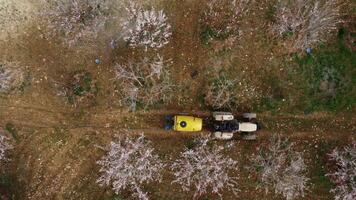 agricultural spraying tractor drone shot photo