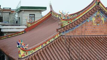 The old fishing village view with the traditional architectures on the south of the China along the ocean coast photo