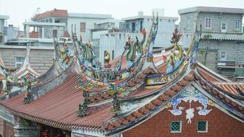 The old fishing village view with the traditional architectures on the south of the China along the ocean coast photo