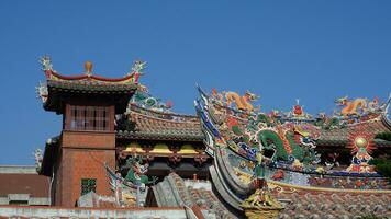 The old fishing village view with the traditional architectures on the south of the China along the ocean coast photo