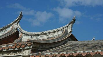 The old fishing village view with the traditional architectures on the south of the China along the ocean coast photo