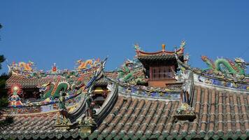 The old fishing village view with the traditional architectures on the south of the China along the ocean coast photo