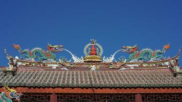 The old fishing village view with the traditional architectures on the south of the China along the ocean coast photo