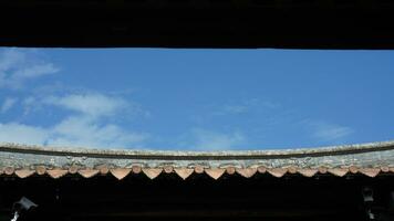 The old fishing village view with the traditional architectures on the south of the China along the ocean coast photo