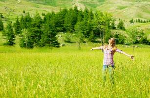 Happy girl enjoying nature photo