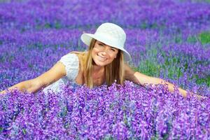 Pretty woman on lavender field photo