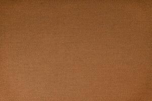 Texture of brown fabric diagonal weave pattern. Decorative textile background photo