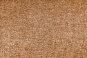 Texture of brown upholstery fabric. Decorative textile background photo