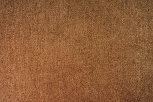 Brown velours upholstery fabric texture background. photo