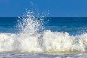 Extremely huge big surfer waves at beach Puerto Escondido Mexico. photo