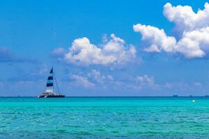 Sailing boats yachts ship jetty Playa del Carmen beach Mexico. photo