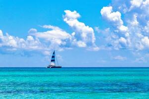 Sailing boats yachts ship jetty Playa del Carmen beach Mexico. photo