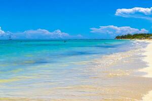 Tropical Caribbean beach clear turquoise water Playa del Carmen Mexico. photo