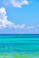 Sailing boats yachts ship jetty Playa del Carmen beach Mexico. photo