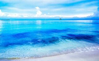 Tropical Caribbean beach clear turquoise water Playa del Carmen Mexico. photo