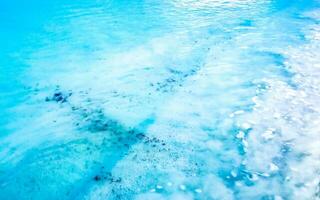 Waves at tropical beach caribbean sea clear turquoise water Mexico. photo