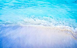 Waves at tropical beach caribbean sea clear turquoise water Mexico. photo