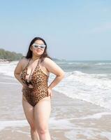 Portrait young woman asian chubby cute beautiful oneperson in bikini brown sexy front viewpoint tropical sea beach white sand clean and bluesky background calm Nature ocean Beautiful wave water travel photo