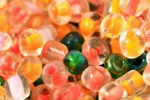 a pile of colorful plastic beads photo