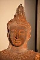 a close up of a buddha statue photo