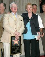 Roger Ebert Virginia Madsen Roger Ebert Receives Star on Walk of Fame Hollywood Walk of Fame Los Angeles CA June 23 2005 photo