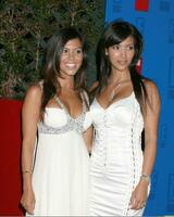 Lindsay and Kourtney Kardashian E Entertainment Party Roosevelt Hotel Los Angeles CA August 2 2005 photo