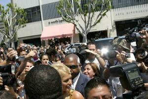 Paris Hilton arriving at Kitson with fans  Press Paris Hilton Appearance at Kitson to Promote her Clothing Line Kitson Los Angeles CA Aug 16 2007 2007 photo