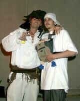 Jason Alexander Ex Husband of Brittney Spears Bryon Bolton Dressed as Kevin Federline with baby Halloween Mansion Party Hosted by Haylie Duff Los Angeles CA October 31 2005 photo