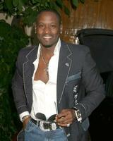 Johnny Gill Hollyrod Designcure featuring Pamela Dennis and her designs at the home of Sugar Ray Leonard and family Pacific Palisaides CA July 9 2005 photo