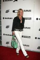 Deborah Kara Unger arriving at the Riders for Health Benefit Event at SURU on Melrose Ave Los Angeles CA on July 11 2009 2008 photo