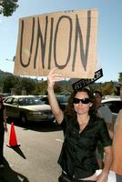 Minnie Driver Screen Actors Guild Support the Writers Guild of America Strike Outside NBCUniversal Studios Lot Lankershim Blvd Los Angeles CA November 13 2007 2007 photo