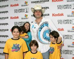 Robert Rodriguez and family arrive at the Shark Boy and Lava Girl Premiere El Capitan Theater Los Angeles CA June 4 2005 photo