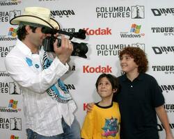 Robert Rodriguez and son Racer Max with Darryl Sabara arrive at the Shark Boy and Lava Girl Premiere El Capitan Theater Los Angeles CA June 4 2005 photo