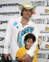 Robert Rodriguez and son Racer Max arrive at the Shark Boy and Lava Girl Premiere El Capitan Theater Los Angeles CA June 4 2005 photo