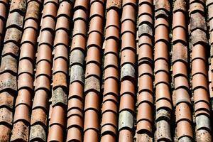 a close up of a roof with many different types of tiles photo