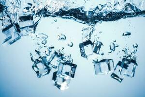 ice cubes falling down. ice cubes on blue background. splash on blue. ice cubes in water photo