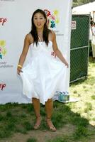 Michelle Kwan arriving at the A Time for Heroes Pediatric AIDS 2008 benefit at the Veterans Administration grounds Westwood CA June 8 2008 photo