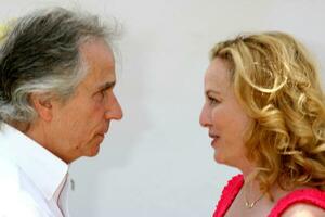 Henry Winkler  Virginia Madsen arriving at the A Time for Heroes Pediatric AIDS 2008 benefit at the Veterans Administration grounds Westwood CA June 8 2008 photo