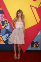 Taylor Swift arriving at  the Video Music Awards on MTV at Paramount Studios in Los Angeles CA onSeptember 7 2008 photo