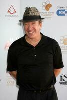 Tim Allen arriving at the National Kidney Foundation Celebrity Golf Classic at the Lakeside Lakeside Golf Club in Burbank CA onMay 4 photo